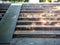 Plank wood stair outdoor with wooden wheelchair ramp