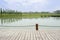 Planked viewing platform in lake on sunny summer day