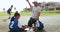 Planning, clipboard and children with coach for soccer prepare for game, match and practice outdoors. Sports, teamwork