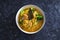 Plant-based food, vegan jackfruit curry with broccoli and onions