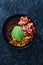 Plant-based food,  vegan mexican style nourish bowl with spicy bean chilli avodaco corn and pico de gallo