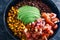 Plant-based food,  vegan mexican style nourish bowl with spicy bean chilli avodaco corn and pico de gallo