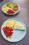 plant-based food  vegan version fo the viral layered tortilla wrap hack with red peppers grated dairy-free cheese avocado and