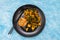 Plant-based food, veganvegan tofu kale and stir fry veggies curry with satay rice