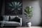 Plant next to grey corner sofa in african living room interior with poster and pouf. Real photo