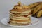 Plantain buttermilk pancakes. Soft and fluffy buttermilk pancake made with a batter added with slices of ripe plantain