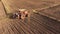 Planting corn on the field in agricultural rural Thailand with tractor