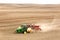 Planting potatoes in the rolling hills in the fertile farm fields of  Idaho