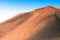 Plants growing in volcanic lava sands desert, Timanfaya volcanoes park, Lanzarote Canary Islands Spain. Travel