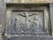 plaque with a crucifixion dated to 1625 Turlough Round Tower