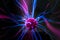 Plasma ball with magenta-blue flames