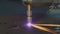 Plasma cutting machine cuts metal material with sparks close up