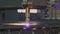 Plasma cutting machine sparks flying close up in 4k