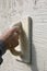 Plasterer inflicts decorative plaster