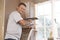 Plasterer Working On Interior Wall