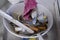 Plastering tools lying in a bucket, seen from above