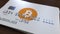 Plastic bank card with bitcoin logo. New ways of cryptocurrency payments conceptual 3D rendering