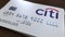 Plastic bank card with logo of Citibank. Editorial conceptual 3D rendering