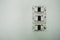 Plastic bare switch stick on white wall in room. this image for