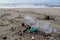 Plastic bottle garbage on sea coast,pollution free ecosystem planet save concept