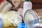 Plastic bottles, paper and metal cans are scattered across the kitchen floor