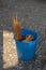 A plastic bucket with water to soak the esparto grass of a craftsman