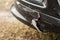 The plastic bumper of a black car cracked. Fiberglass properties in car parts