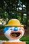 Plastic clown trashcan/wastebasket in an amusement park