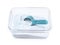 Plastic container with laundry powder and measuring spoon isolated