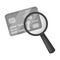 Plastic credit card with a magnifying glass. Detective looking for fingerprints.Detective single icon in monochrome