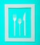 Plastic cutlery for picnics in a white frame on a yellow background. A disposable spoon, fork, knife. Top