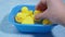 Plastic ducklings ready for child s fun in the bath. play in the water while bathing. rubber ducks.