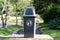 Plastic dust bin in garden