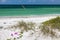 Plastic flamingoes on a beautiful Florida beach