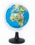 Plastic globe with Africa continent on foreground, white background