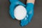 Plastic granules . Polypropylene, polyethylene pellets in hands with gloves. Quality control of plastic in the laboratory in