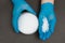 Plastic granules . Polypropylene, polyethylene pellets in hands with gloves. Quality control of plastic in the laboratory in