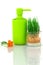 Plastic green bottle with fresh sprouts of wheat in glass bowl a
