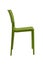 Plastic green chair with a wicker back. Patio or cafe furniture.