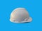 Plastic hard white safety construction helmet on white background