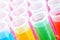 Plastic laboratory chemical test tubes with colorful solution