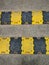 Plastic made yellow and black speed breaker