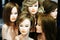 Plastic mannequins with beautiful hairstyles for hairdressing practice. Close-up