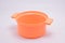 Plastic orange cooking casserole toy played by kids