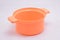 Plastic orange cooking casserole toy played by kids