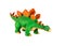 Plastic orange and green dinosaur toy, Stegosaurus