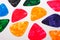 Plastic picks of different colors for playing acoustic or electric guitar