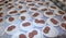 plastic plates with slices of meatloaf prepared for a large community lunch