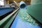 Plastic recycling plant. Conveyor with shredded plastic