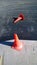 Plastic red traffic cones. Road traffic barrier. Pylons for traffic control. Construction site. Repair work. Channelizing devices